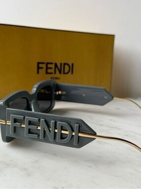 Fendi Gray Sunglasses with Gold Accents